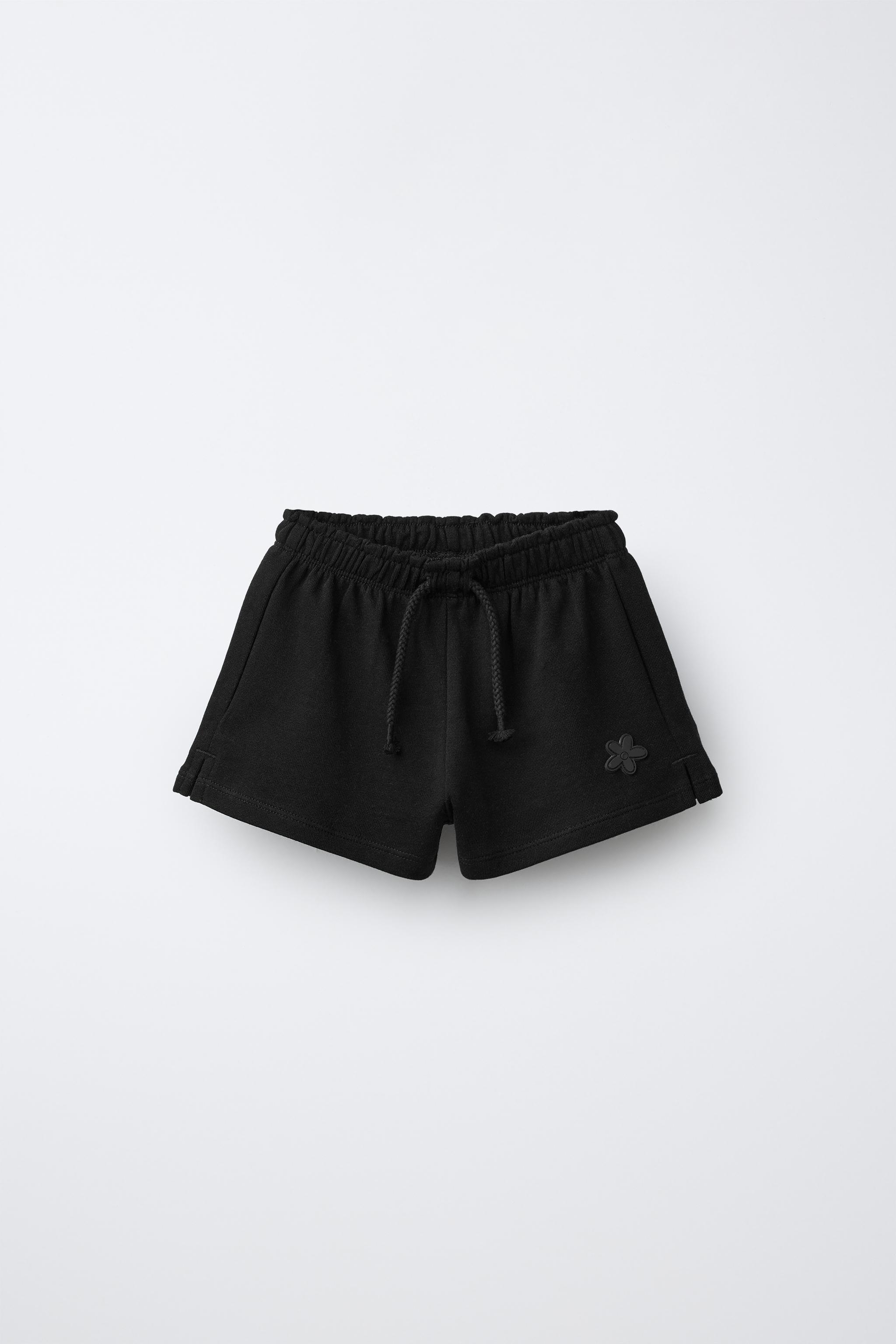 RUBBERIZED APPLIQUÉ PLUSH SHORTS